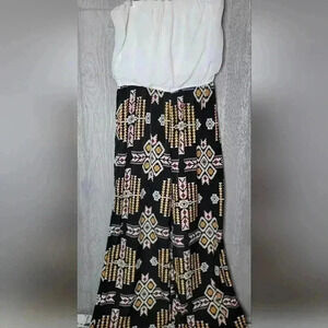 Cure tube top body suit  with Aztec brand. Black and yellow pants white top. XL